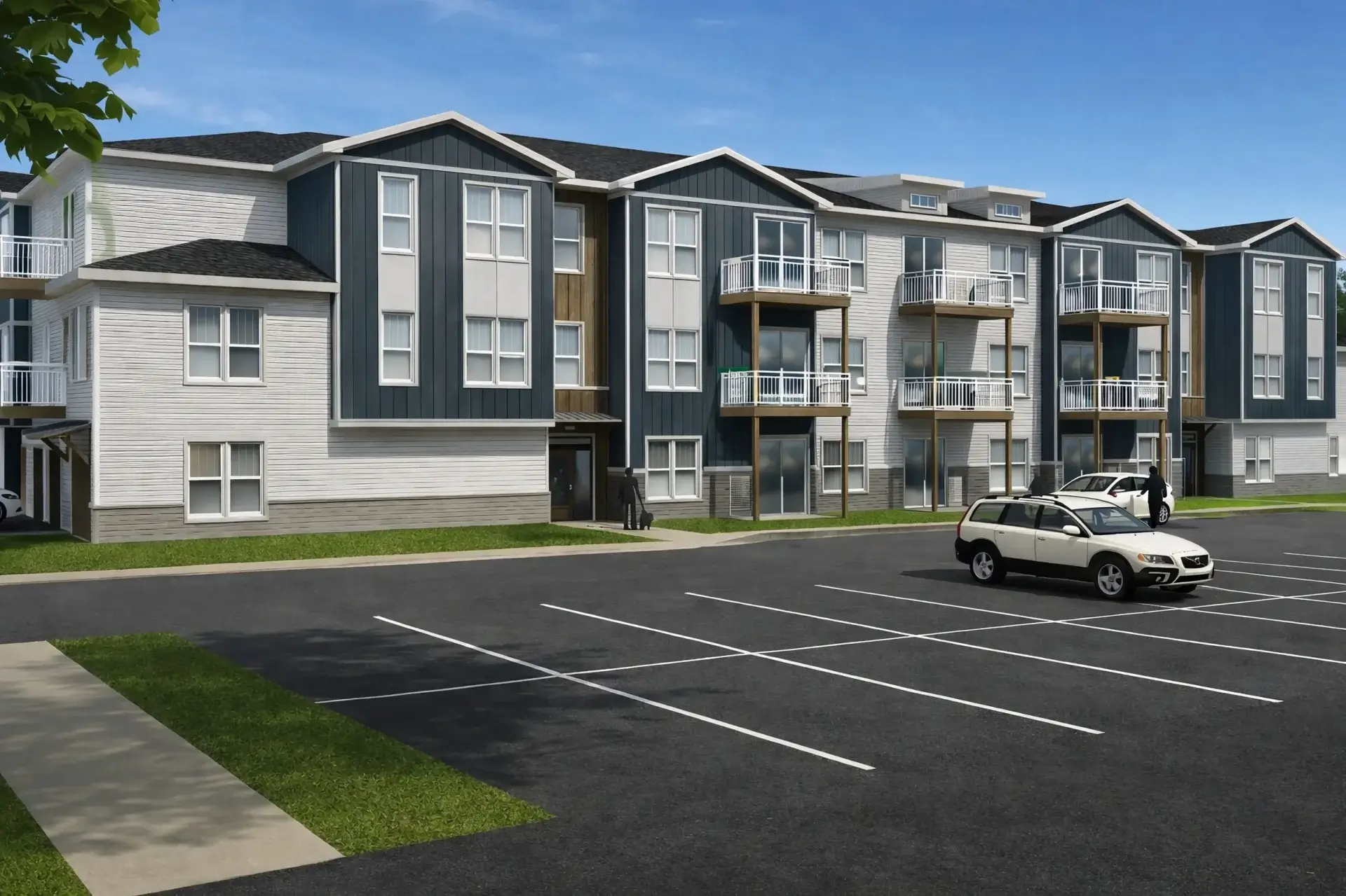 Modern apartment building exterior with balconies and parking at Legacy at Bristol in Bristol, WI